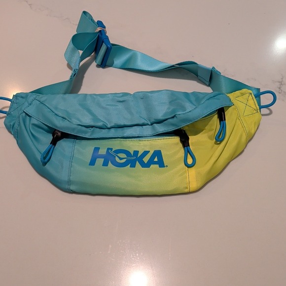Hoka Handbags - HOKA Fanny /Waist Pack Sling Bag adjustable zip pockets Blue/yellow